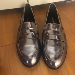 Silver Calvin Klein penny loafers